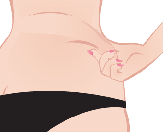 Mulher apertando gordura localizada